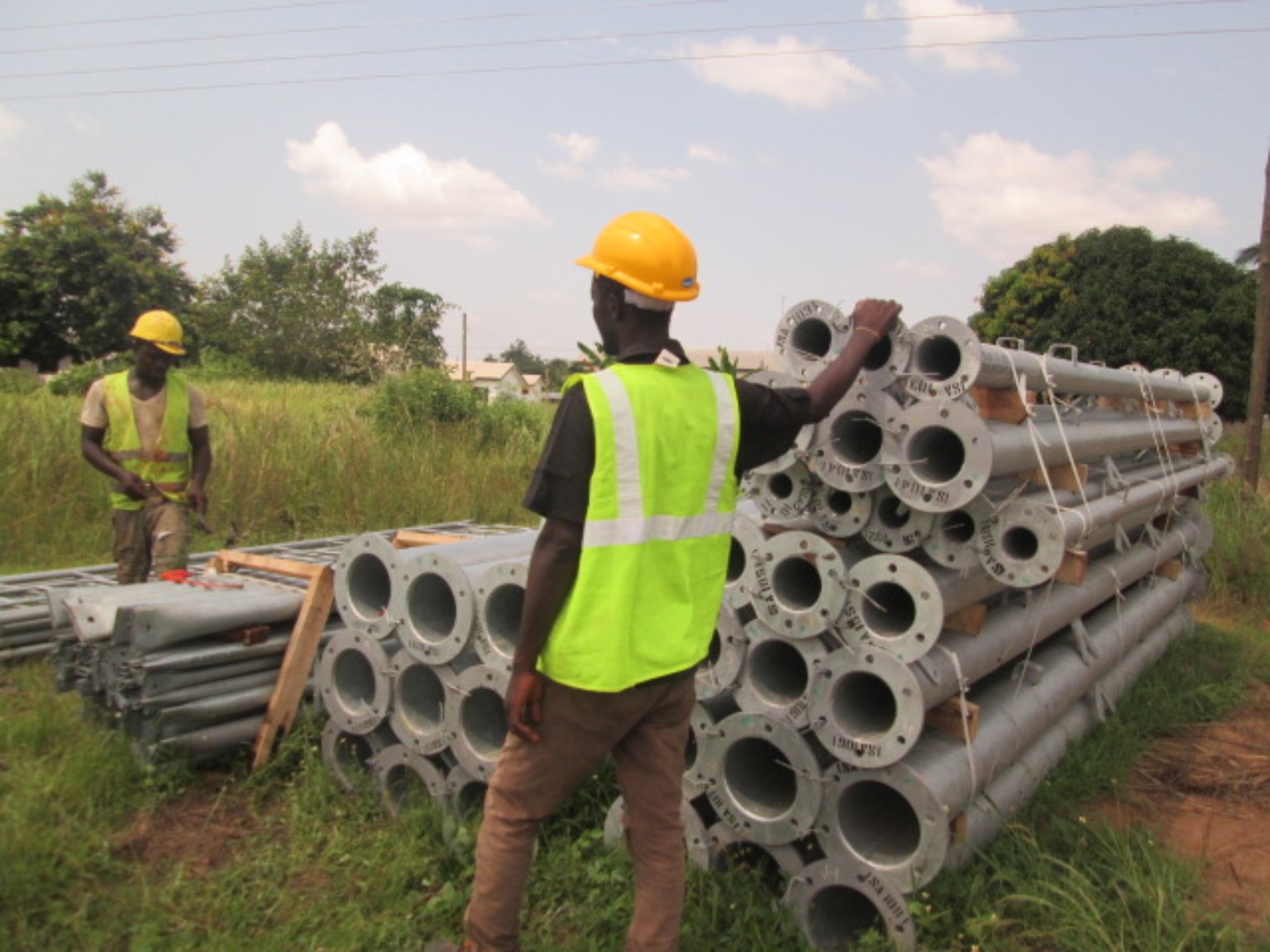 Tower components being prepared for site installation