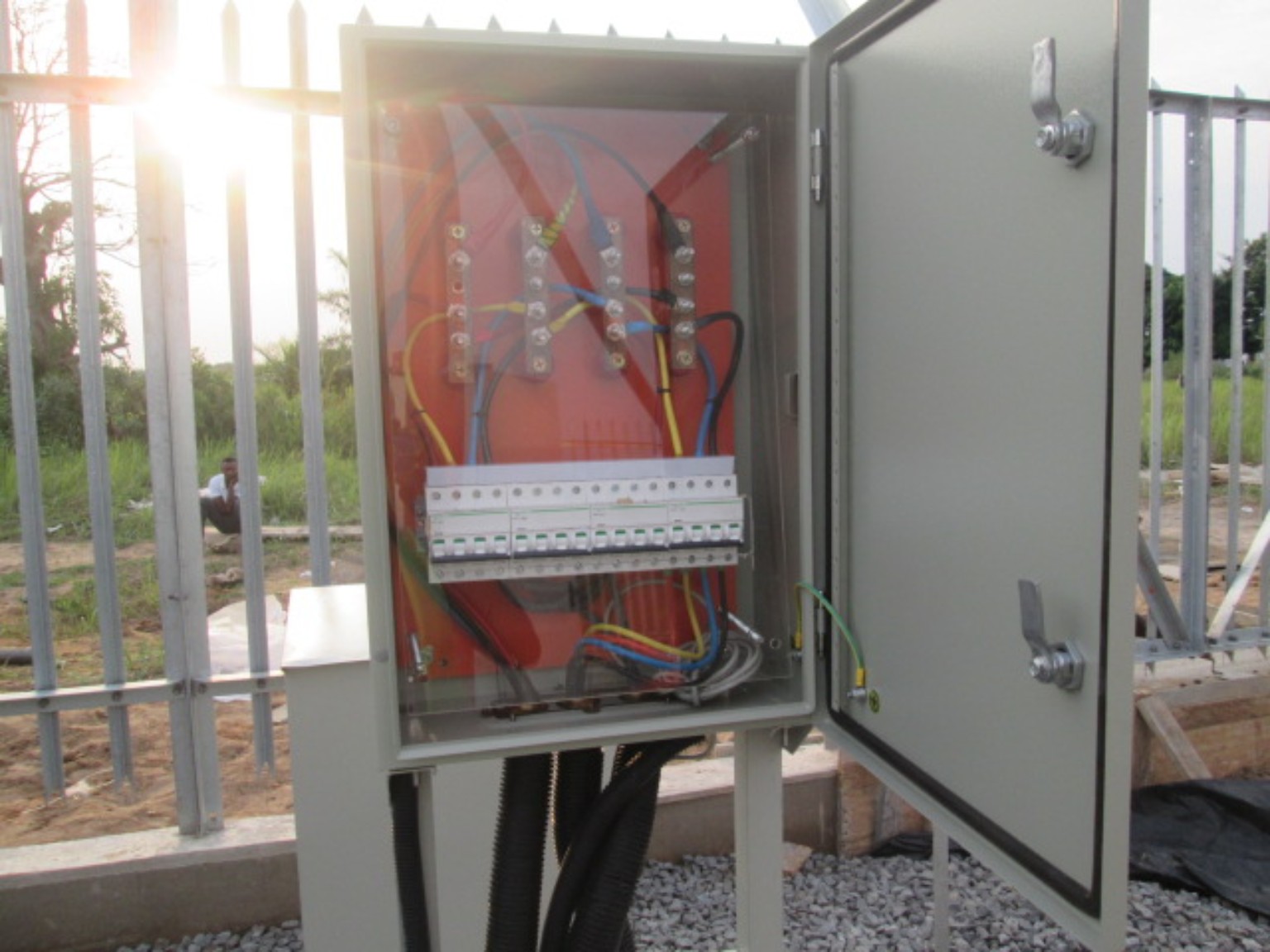 Electrical distribution panel installation at a telecommunications site
